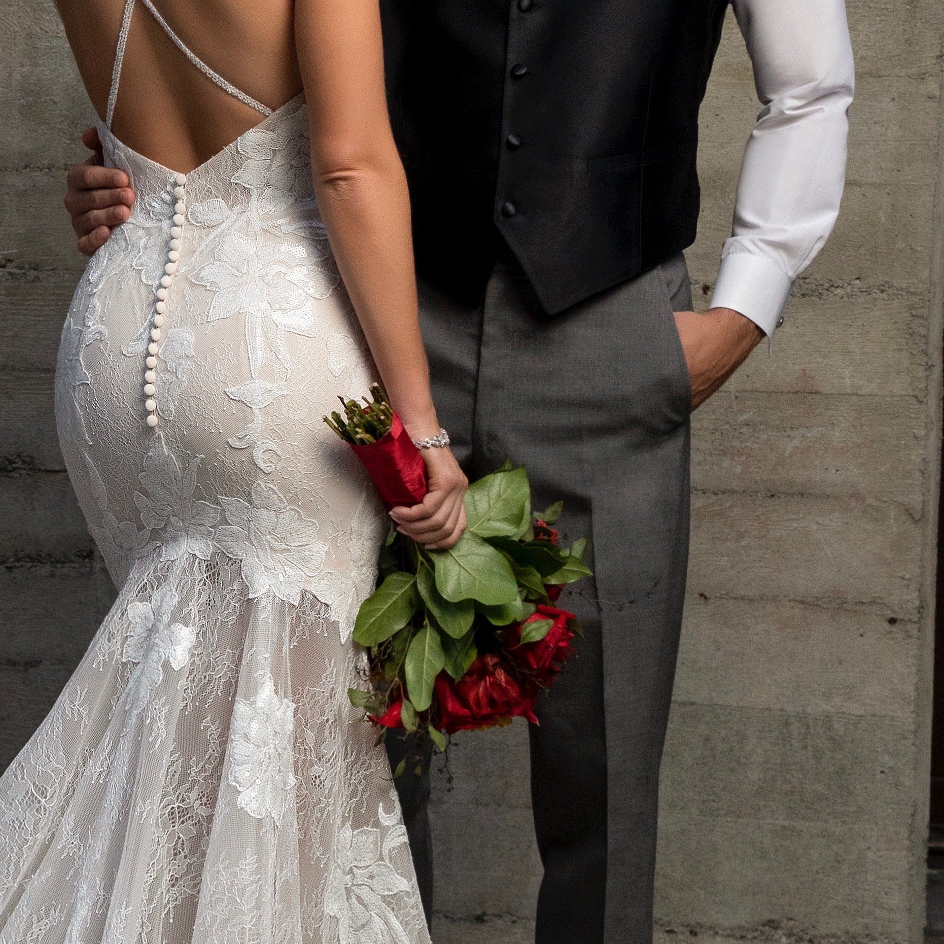 Bride and Groom, Bride is wearing a Kitty Chen Gown and the Raven Cubic Zirconia Bracelet