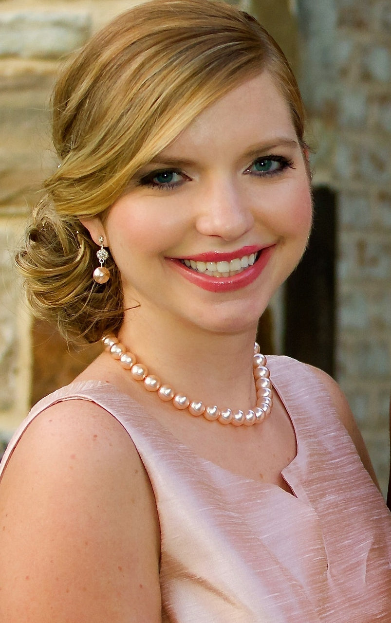 Ellie Colored Pearl Earrings worn by a Bridesmaids in Pink.