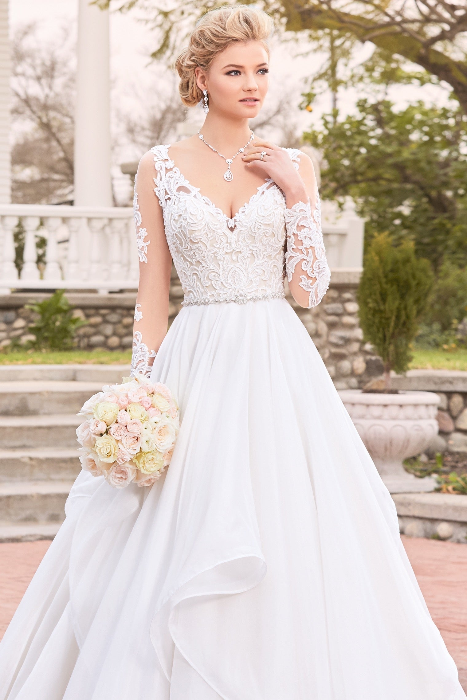 Bride wearing Anna Bellagio's Addison Vintage Inspired Y Necklace and the Adele Gown from designer Kitty Chen Couture