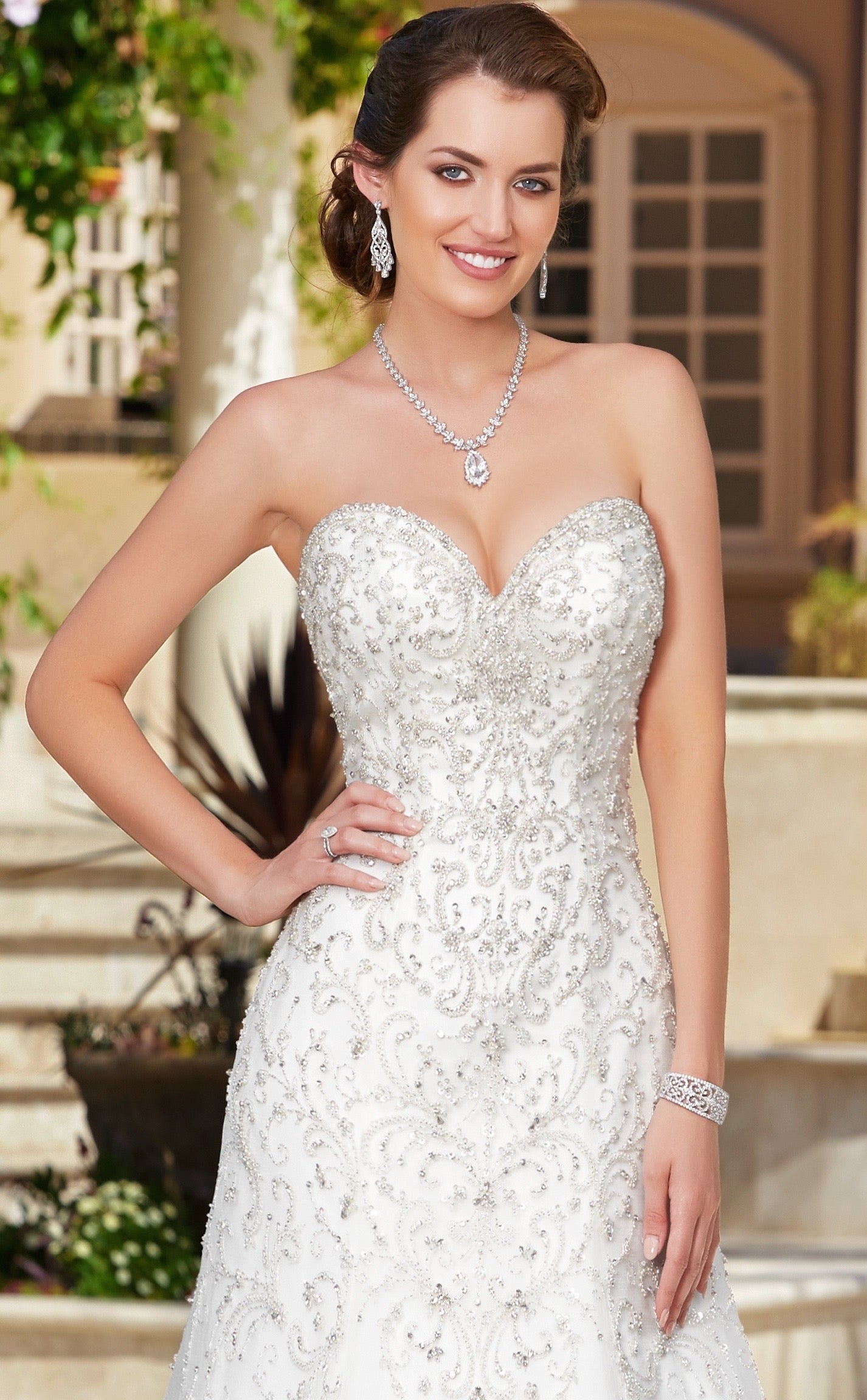 Kyra Cuff Bracelet, Saranna Earrings and Chiesa Necklace on Model wearing the Cassia Gown from Kitty Chen Couture