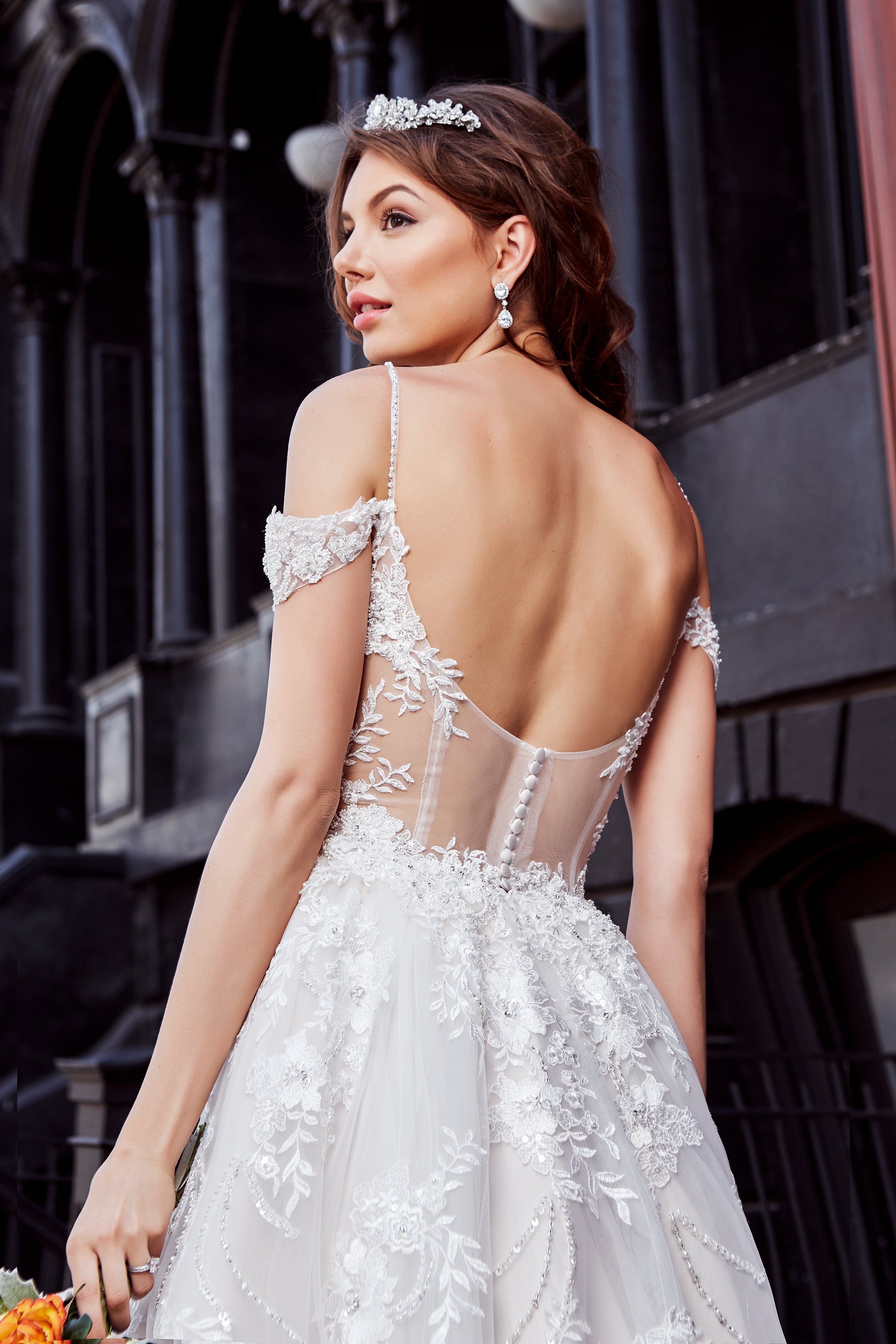 Alaine Earrings Model wearing the Lorena Gown by Kitty Chen Couture