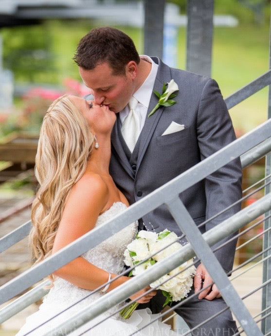 Bride and Groom on Wedding Day Bride is wearing the Jada Earrings. 