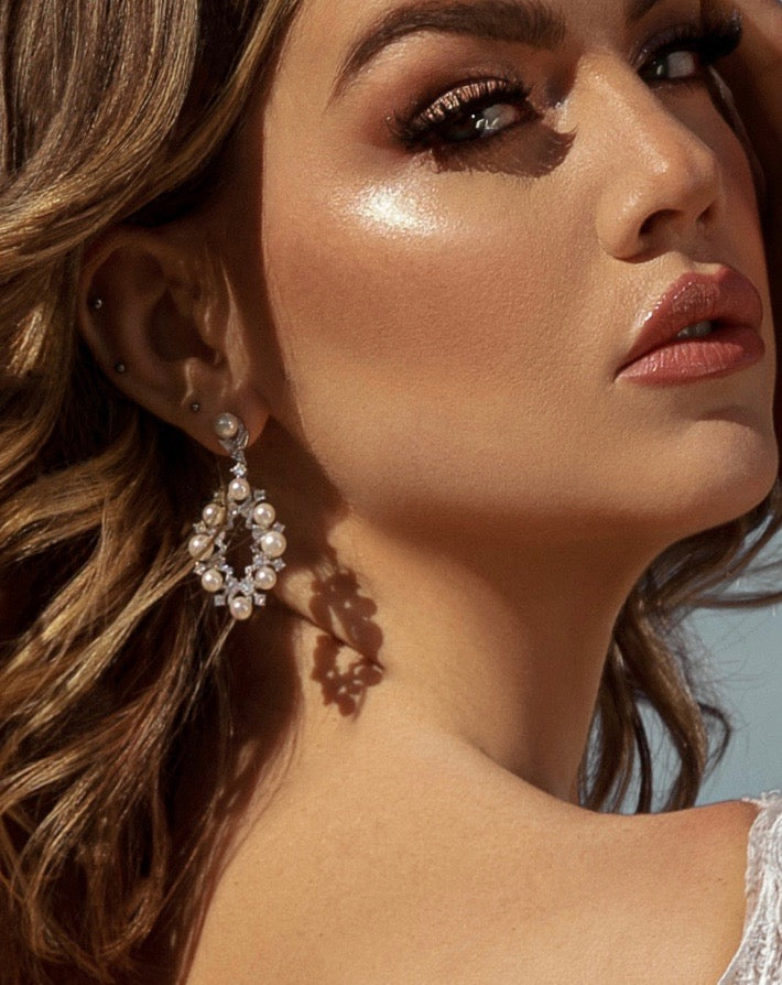 Bianca Pearl Hoop Statement Earrings | Anna Bellagio  Closeup of Model wearing the Pearl Hoop Statement Earrings. 