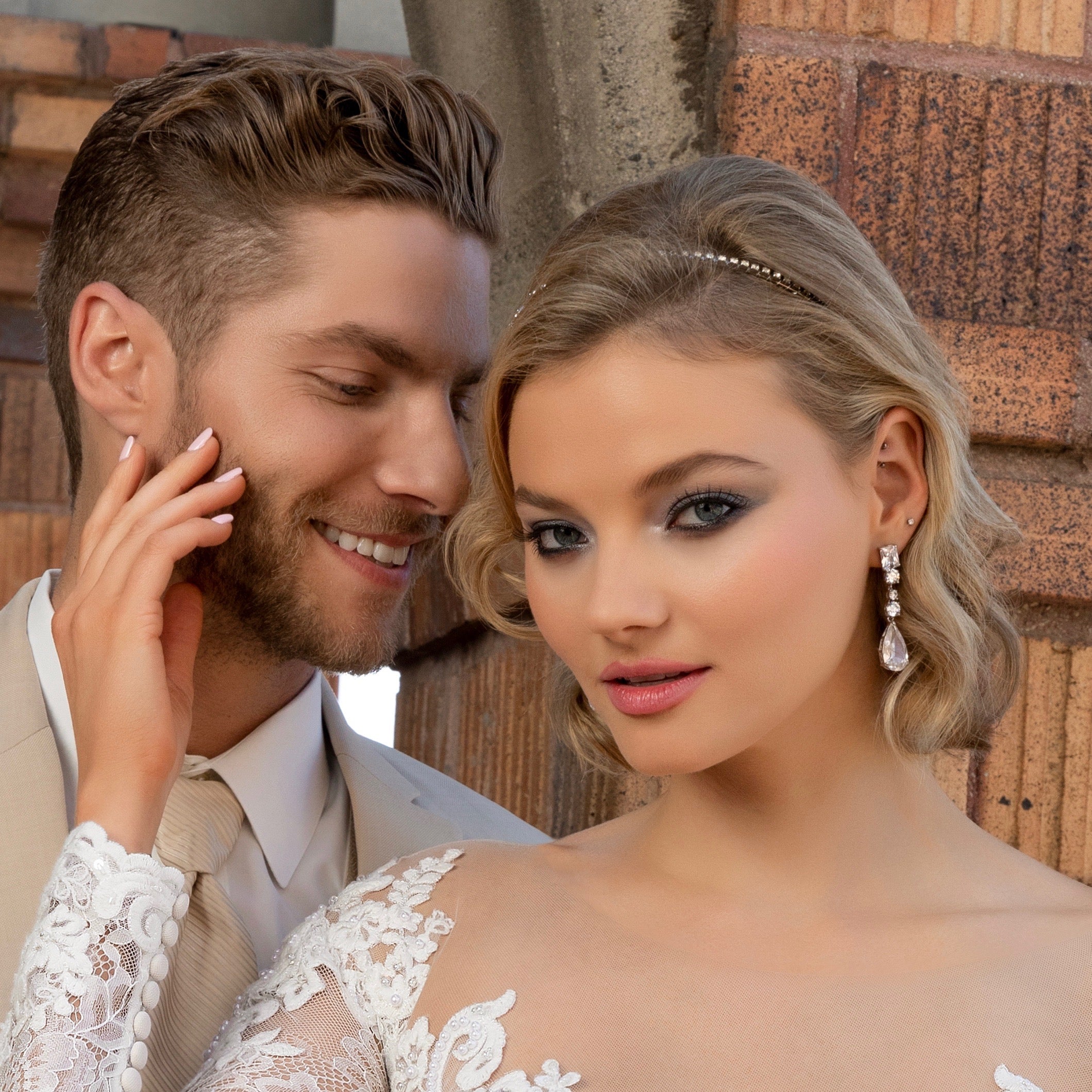 Brielle Linear Dangle Earrings on a Bride standing with her Groom. 