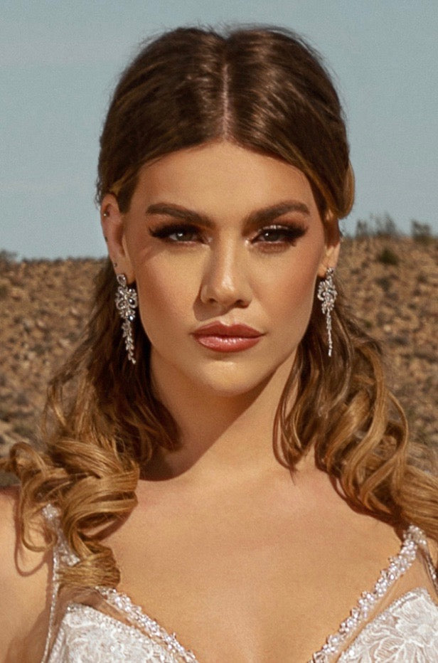 Trina Statement Earrings Close-up of a Model wearing the Earrings and a Kitty Chen Bridal Gown in the Desert