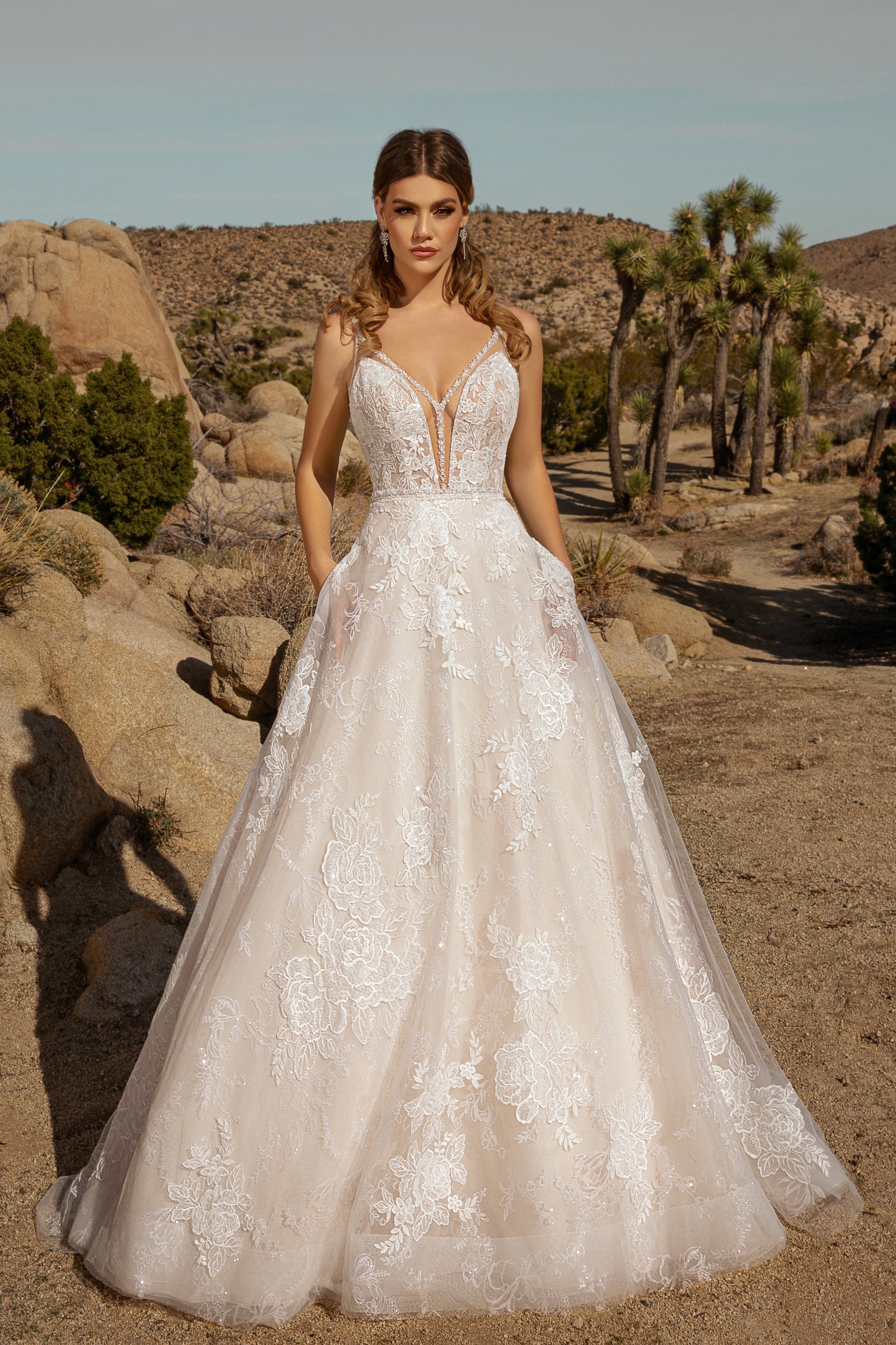 Trina Statement Earrings Model Image | Anna Bellagio Model wearing the Trina Earrings and a Kitty Chen Bridal Gown in the Desert
